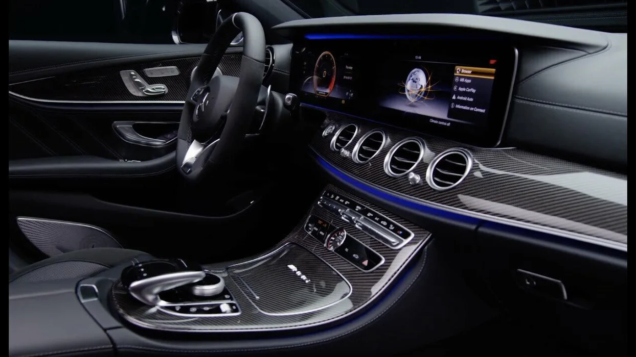 Mercedes carbon fiber interior trim on dashboard and center console showing lightweight luxury materials