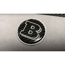 Brabus carbon fiber emblem on the top of the hood