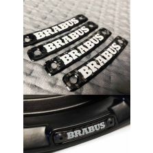 Brabus carbon badge with white letters on G Wagon wheels