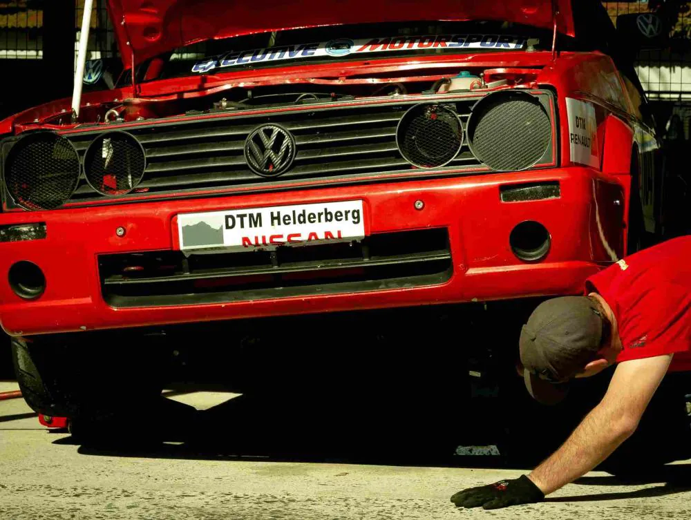 Mechanic installing parts