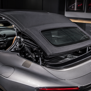 Convertible top guide for luxury cars